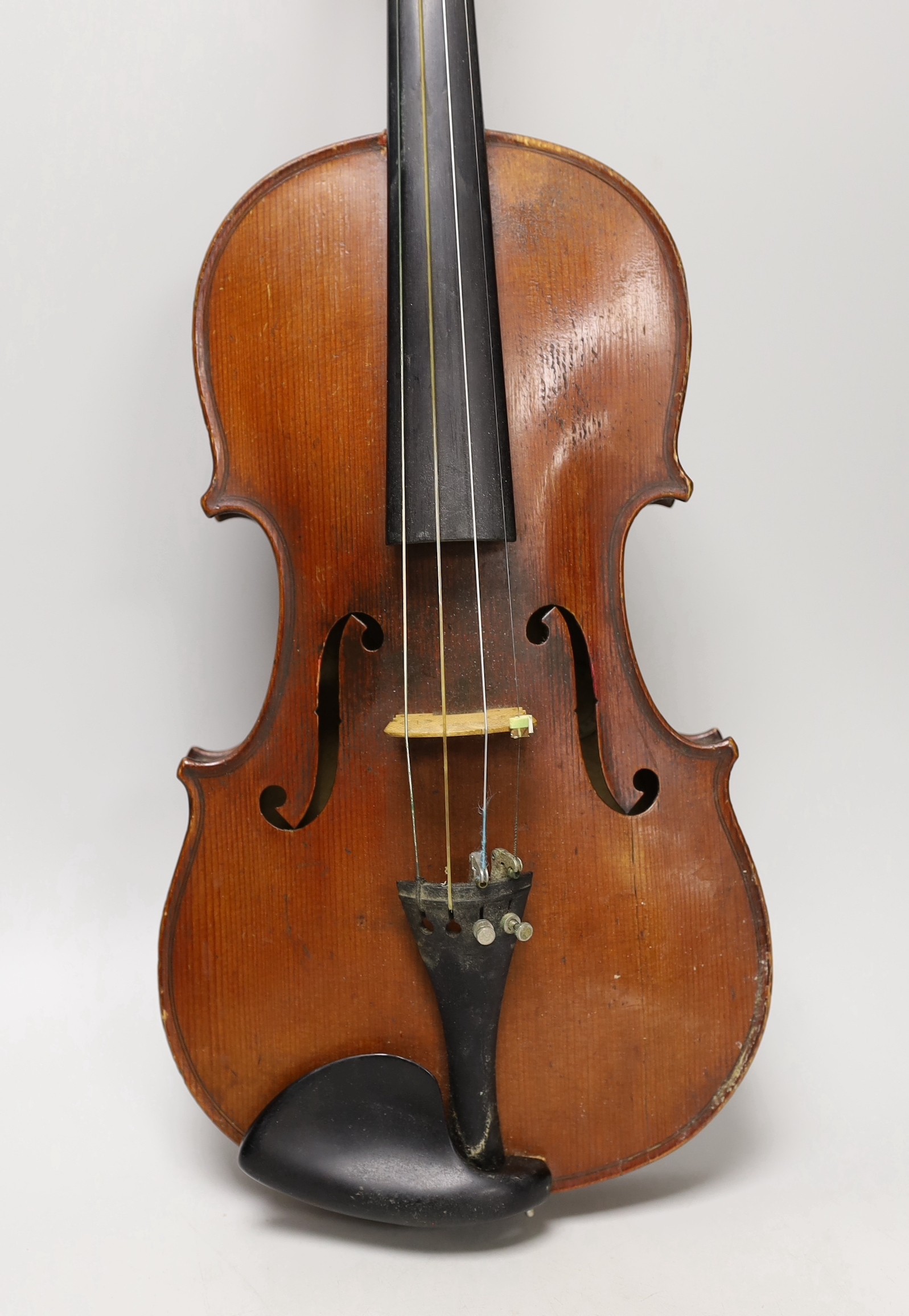 A cased French double backed violin, interior label reads ‘Copie de J.B. Vuillaume à Paris.’ Back measures 36cm excluding button
